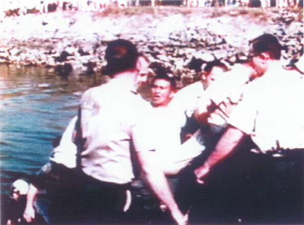 Billy Frank, center, is arrested during a "fish-in" near the Washington State Capitol in Olympia in the late 1960s.